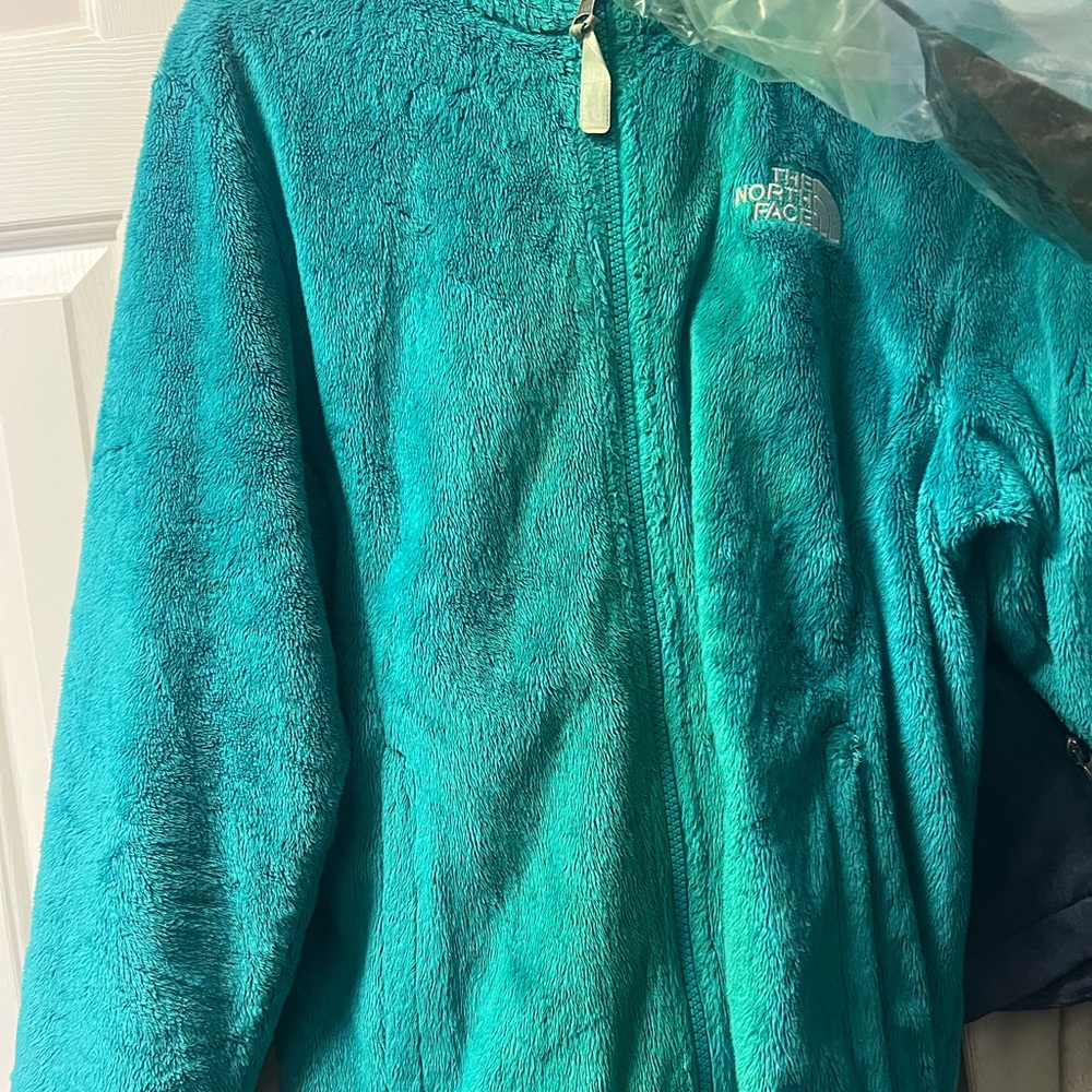 Medium blue women’s north face 
No damage